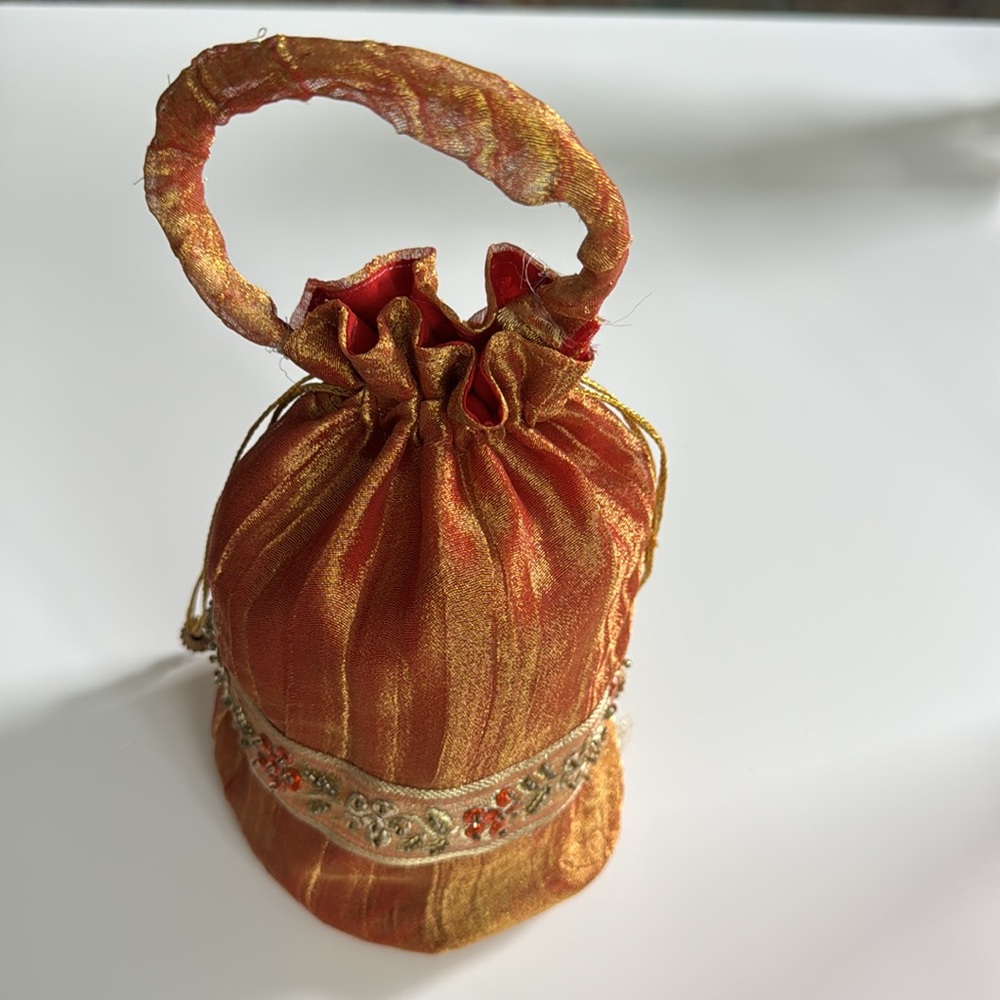 Small Indian purse with handle and drawstring